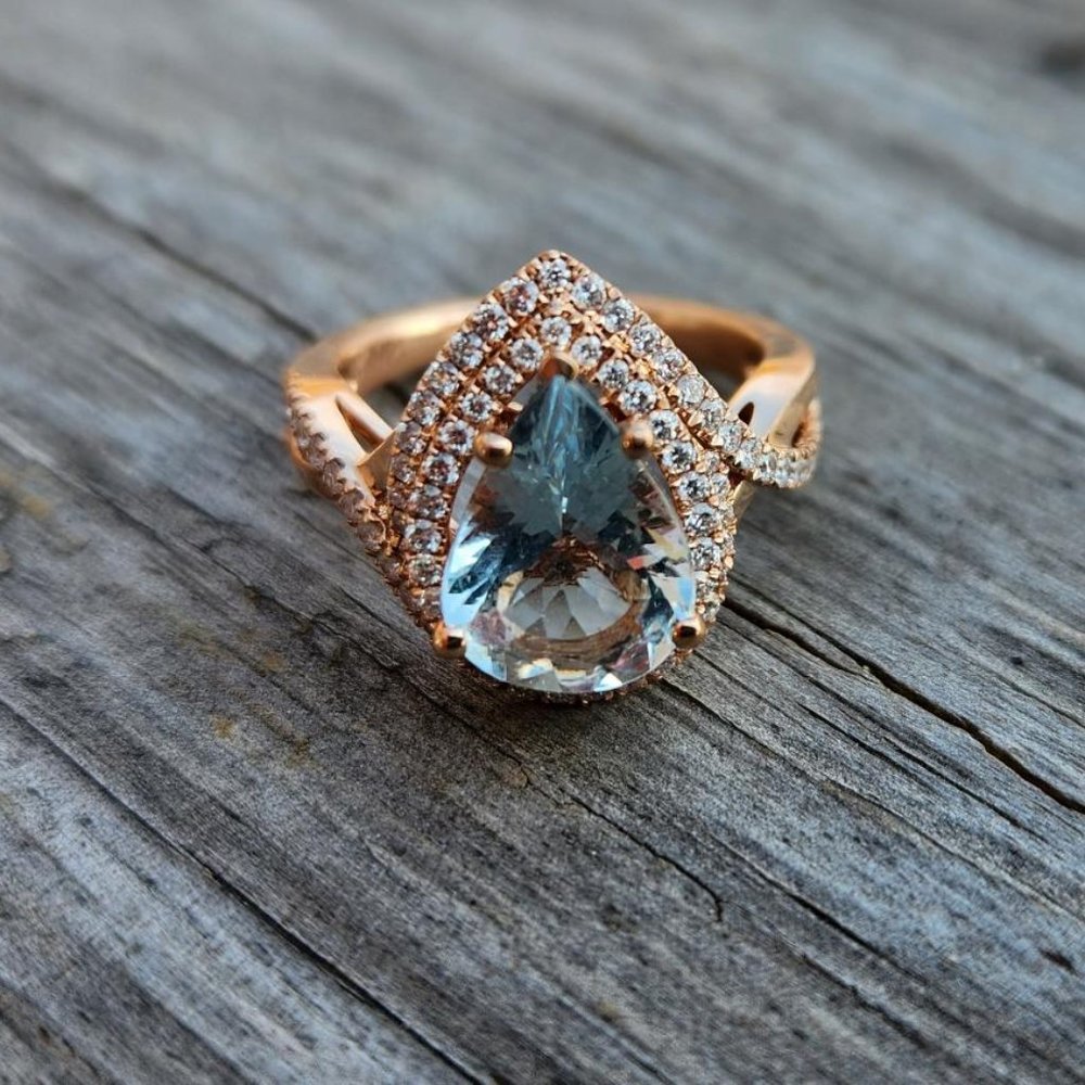 14K rose gold ring with aquamarine stone and diamonds halo